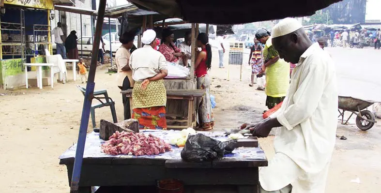 Locally made beef stew sold in Bagnon market at Yopougon, Abidjan. 