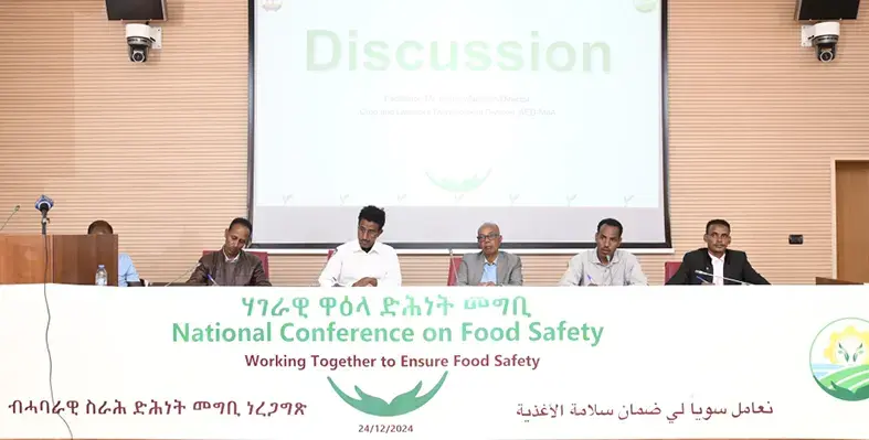 Speakers seated at the event 